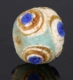 Ancient layered glass eye bead, Persia