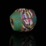 Medieval green glass bead with mosaic checkerboard, 8-9 century